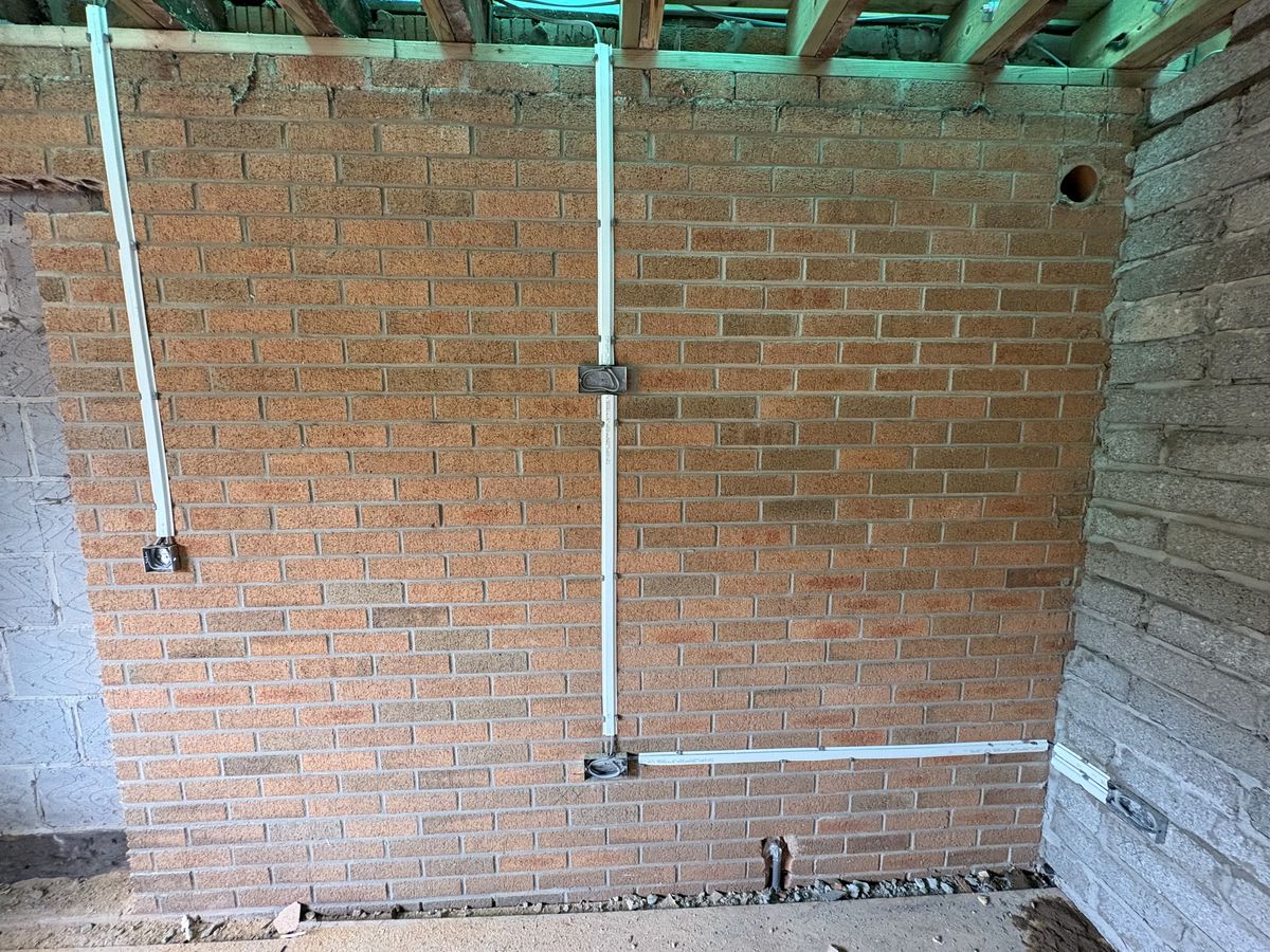 New wiring runs and back boxes for a garage conversion in Bristol